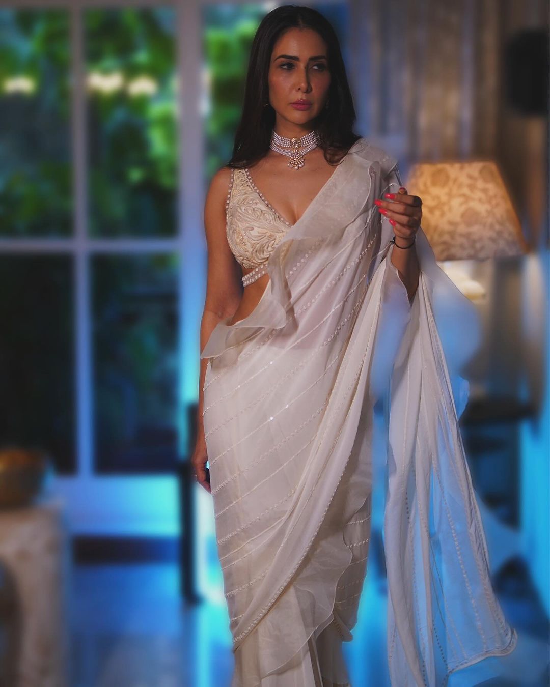 Bollywood Actress Kim Sharma Stills in White Saree